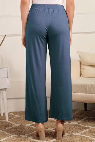 Model wears Denim Blue Pajama; high waistband offers seamless belly support.