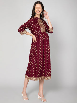 https://houseofzelena.com/collections/maternity-dresses/products/crimson-golden-maternity-dress